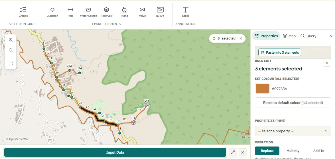 Three pipes of the main line selected on the map, with the Paste into 3 elements button above the Bulk edit panel.